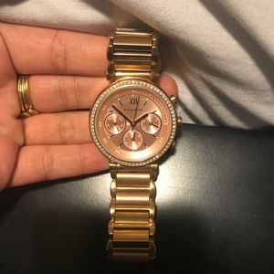 Gold coach watch